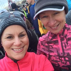 We stayed together the first couple miles, and she caught me at mile 9 walking-thankfully her motivation got me running up that terrible hill!