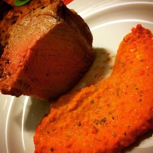 Prime Rib with my red pepper and carrot puree!  Plating is sloppy, but hey I only have 9 fingers.  LOL
